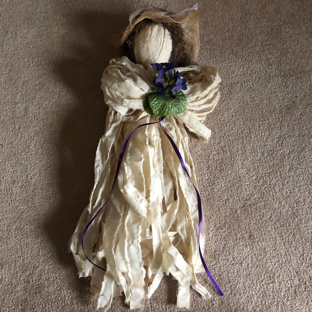 Linen faceless doll with hat and flowers
